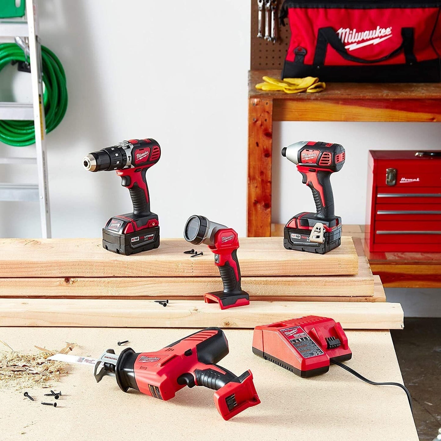 Milwaukee M18 combo kit, drill, impact, saw & light, 2 batteries, charger, case